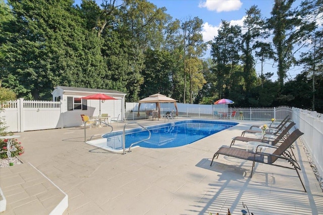 82 E Cedar St, Poughkeepsie, NY 12601 - view of swimming pool with a patio, an outbuilding, a fenced backyard, and a gazebo