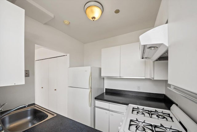23 Water Grant St Unit 11C, Yonkers, NY 10701 - kitchen featuring a sink, white appliances, exhaust hood, dark countertops, and white cabinets