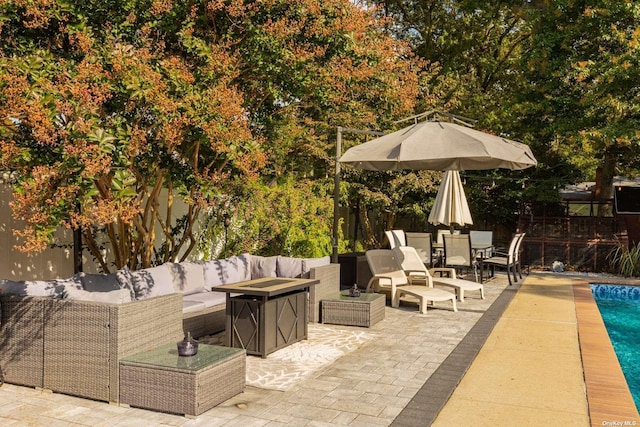 view of patio / terrace featuring a fenced in pool, a fenced backyard, and outdoor lounge area