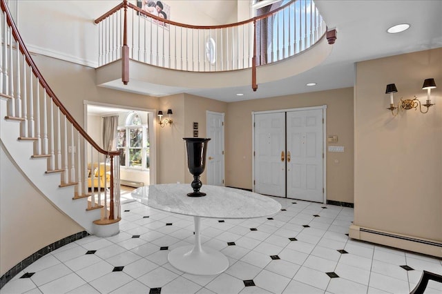 4 Pine Glen Dr, Blauvelt, NY 10913 - foyer entrance featuring stairs, baseboards, a high ceiling, baseboard heating, and recessed lighting