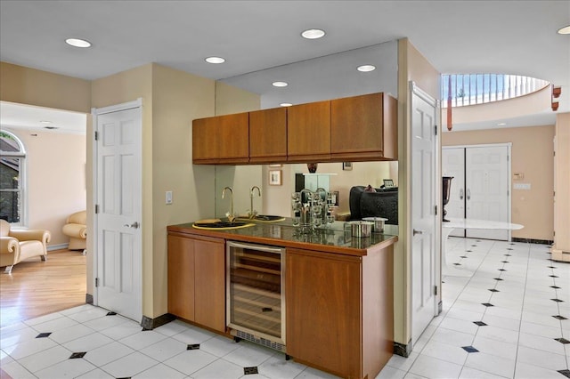 4 Pine Glen Dr, Blauvelt, NY 10913 - bar with wine cooler, light tile patterned flooring, baseboards, recessed lighting, and a sink