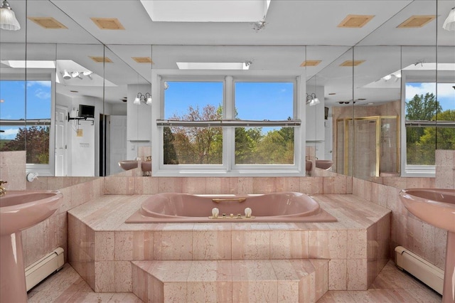4 Pine Glen Dr, Blauvelt, NY 10913 - bathroom featuring baseboard heating, a shower stall, and a bath
