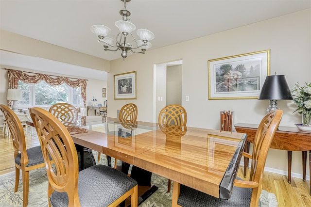 8 Ferndale Rd, New City, NY 10956 - dining area featuring a chandelier and light wood finished floors