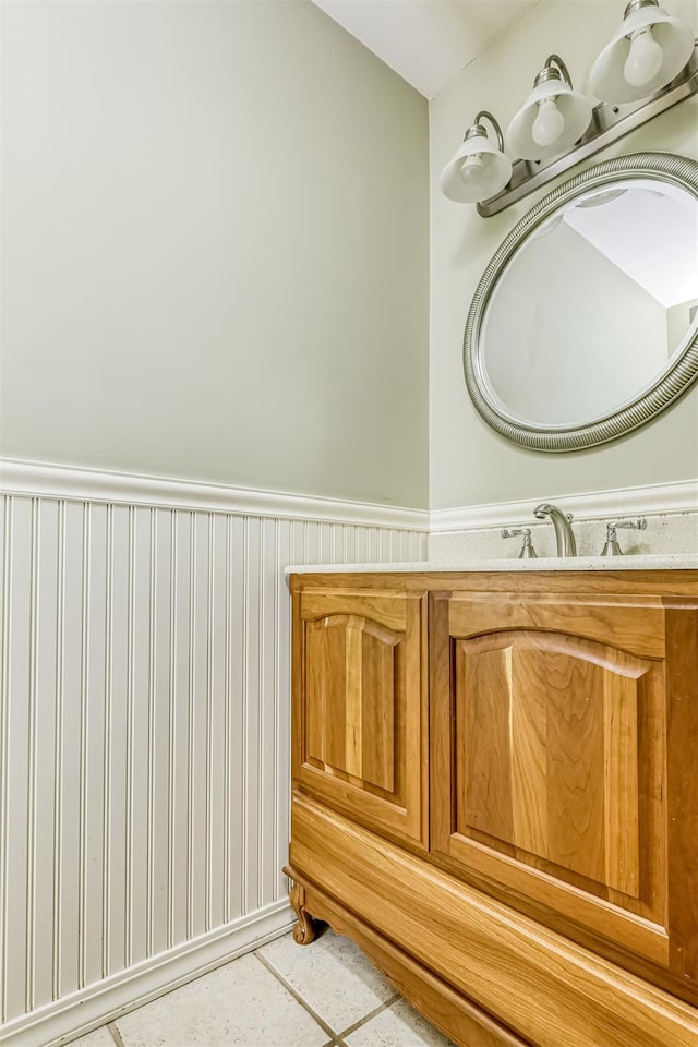8 Ferndale Rd, New City, NY 10956 - bathroom featuring a sink and a wainscoted wall
