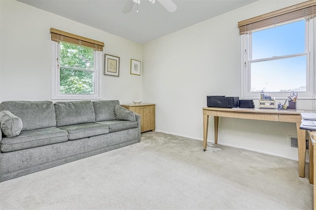 8 Ferndale Rd, New City, NY 10956 - living room featuring light carpet, a ceiling fan, a desk, and baseboards