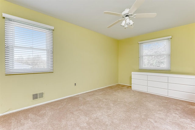 8 Ferndale Rd, New City, NY 10956 - spare room with light carpet, ceiling fan, and baseboards