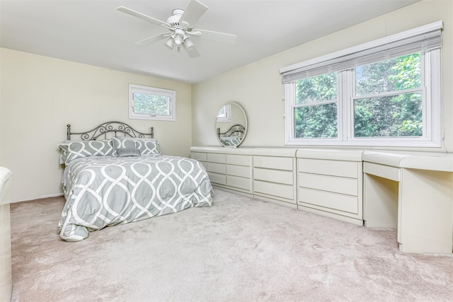 8 Ferndale Rd, New City, NY 10956 - bedroom with light colored carpet, a desk, and ceiling fan
