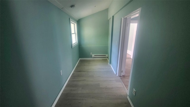 107 Garden St, Poughkeepsie, NY 12601 - corridor featuring baseboards, wood finished floors, and baseboard heating