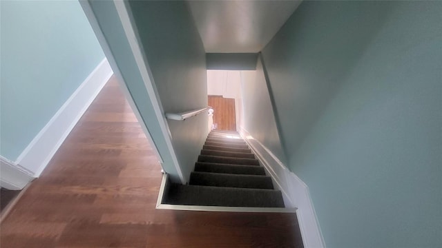 107 Garden St, Poughkeepsie, NY 12601 - stairway featuring baseboards and wood finished floors