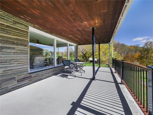 view of patio featuring ceiling fan