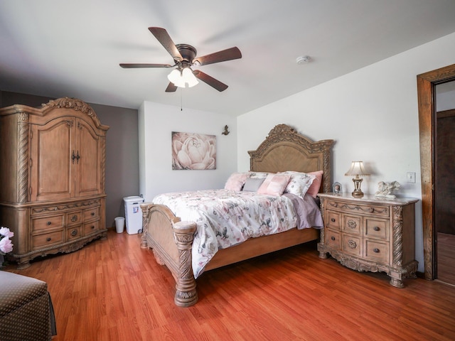 bedroom featuring ceiling fan and light wood-style flooring