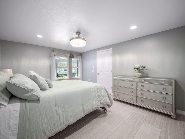 bedroom with recessed lighting