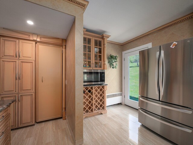 6204 Rte 52, Ellenville, NY 12428 - kitchen featuring stainless steel appliances, radiator heating unit, glass insert cabinets, and light wood-style flooring