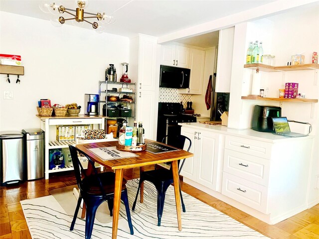 dining space with a chandelier