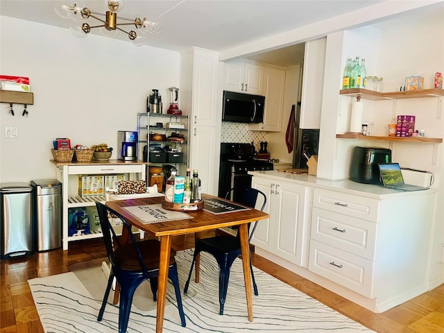 108 Sagamore Rd Unit 5F, Tuckahoe, NY 10707 - dining room featuring a chandelier