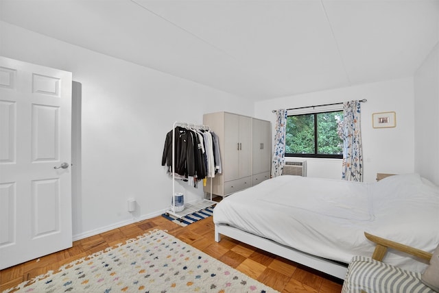 108 Sagamore Rd Unit 5F, Tuckahoe, NY 10707 - bedroom with baseboards and cooling unit
