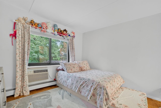 108 Sagamore Rd Unit 5F, Tuckahoe, NY 10707 - bedroom with a baseboard radiator, baseboard heating, and a wall mounted AC