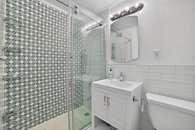108 Sagamore Rd Unit 5F, Tuckahoe, NY 10707 - bathroom featuring tile walls, vanity, and a shower stall