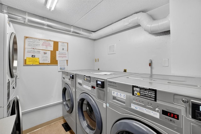 108 Sagamore Rd Unit 5F, Tuckahoe, NY 10707 - shared laundry room featuring independent washer and dryer, a textured ceiling, and estacked washer and dryer