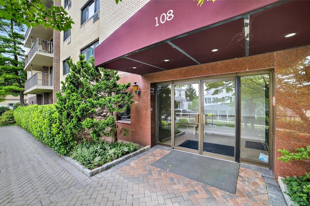 108 Sagamore Rd Unit 5F, Tuckahoe, NY 10707 - doorway to property featuring brick siding