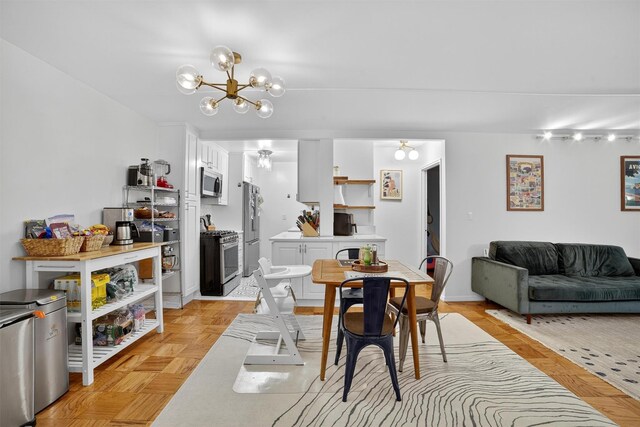 108 Sagamore Rd Unit 5F, Tuckahoe, NY 10707 - dining room featuring a chandelier
