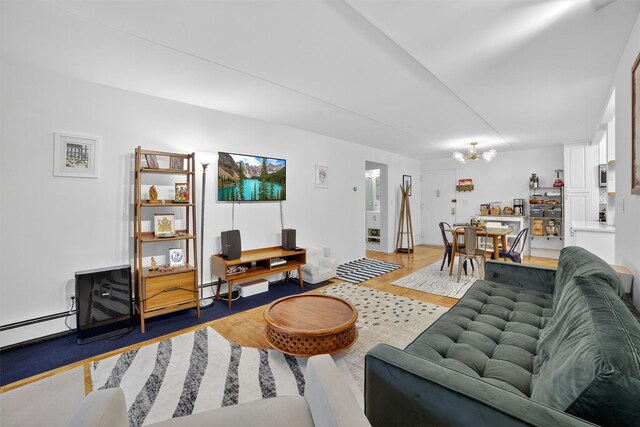 108 Sagamore Rd Unit 5F, Tuckahoe, NY 10707 - living area featuring a chandelier, light wood-style floors, and baseboard heating