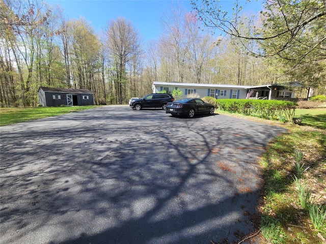 view of parking with driveway