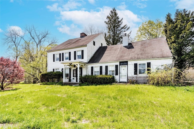 2641 Salt Point Tpke, Clinton Corners, NY 12514 - view of front of property with a chimney and a front yard