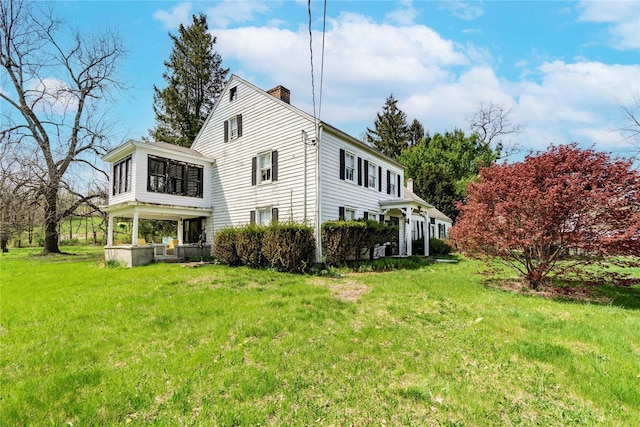 2641 Salt Point Tpke, Clinton Corners, NY 12514 - view of side of home with a chimney and a yard