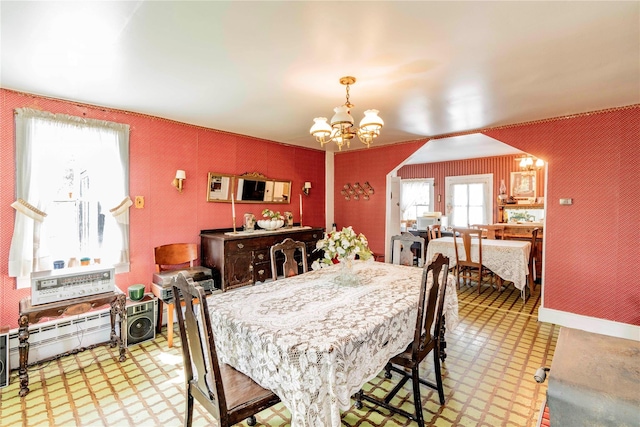 2641 Salt Point Tpke, Clinton Corners, NY 12514 - dining space featuring a chandelier, tile patterned floors, a baseboard heating unit, and wallpapered walls