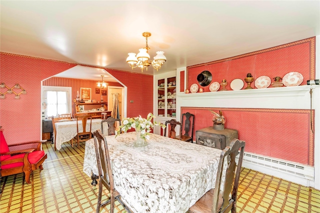 2641 Salt Point Tpke, Clinton Corners, NY 12514 - dining room with a chandelier, a baseboard heating unit, and tile patterned floors
