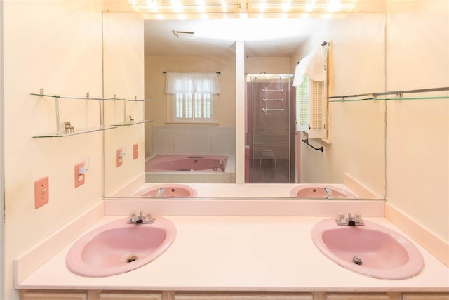 57 E Rock Cut Rd, Walden, NY 12586 - full bathroom with a shower stall, a garden tub, and double vanity