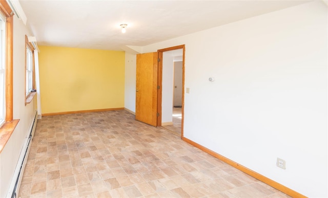 57 E Rock Cut Rd, Walden, NY 12586 - unfurnished room featuring baseboards and a baseboard radiator