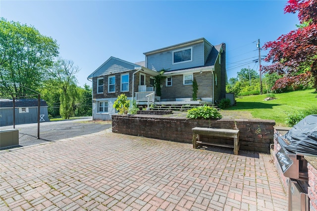 57 E Rock Cut Rd, Walden, NY 12586 - view of front of property featuring a front yard