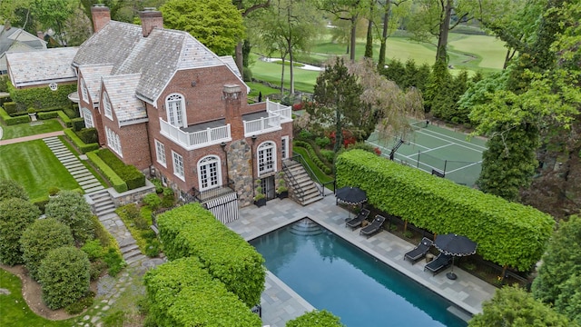 view from above of property with a pool
