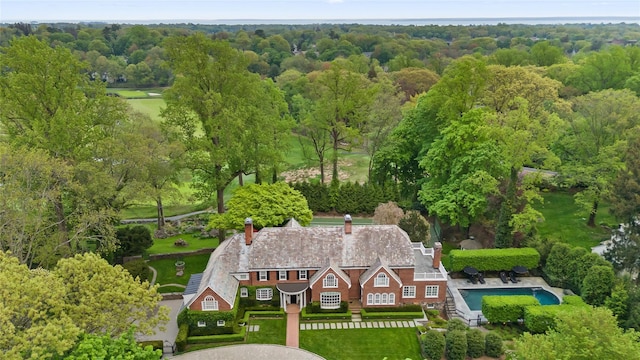 view from above of property with a forest