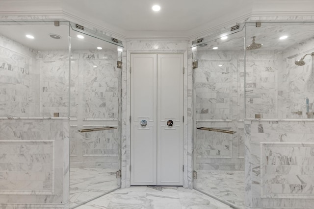 bathroom featuring marble finish floors, a marble finish shower, and recessed lighting