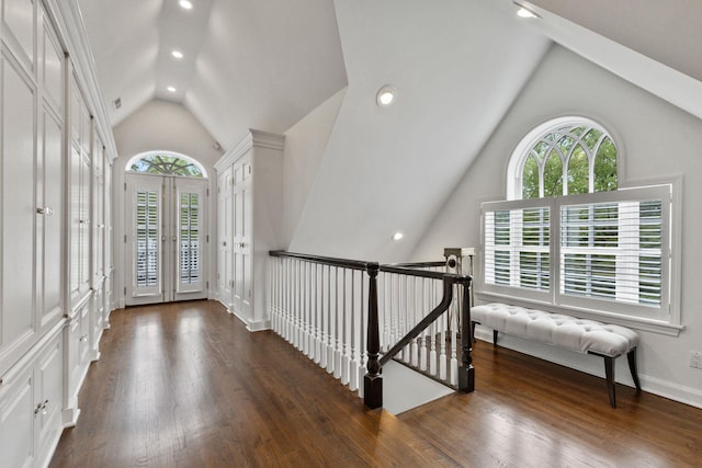 entrance foyer with vaulted ceiling, wood finished floors, recessed lighting, and french doors