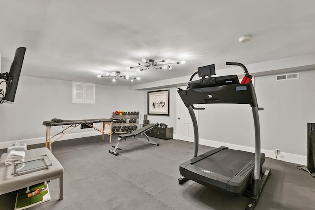 workout area with baseboards