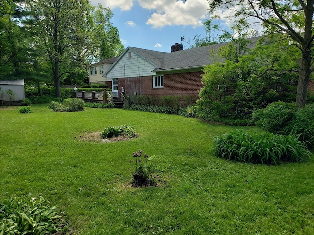 214-40 24th Ave, Bayside, NY 11360 - view of grassy yard featuring a deck