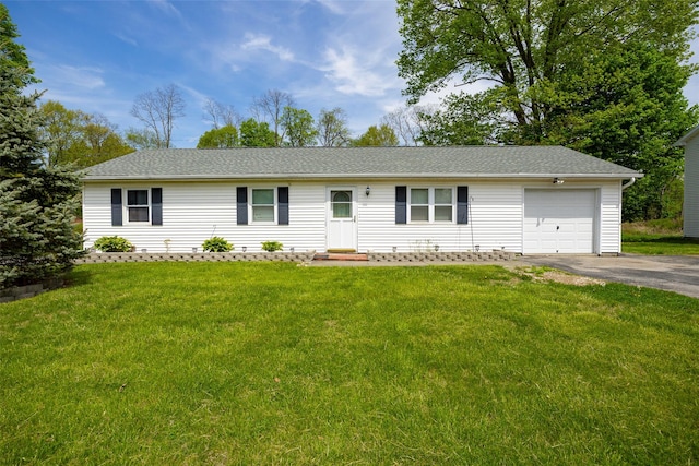 single story home featuring a garage, aphalt driveway, a front yard, and entry steps