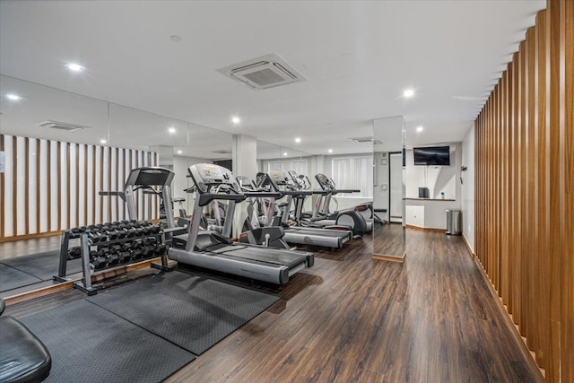 gym featuring visible vents and wood finished floors
