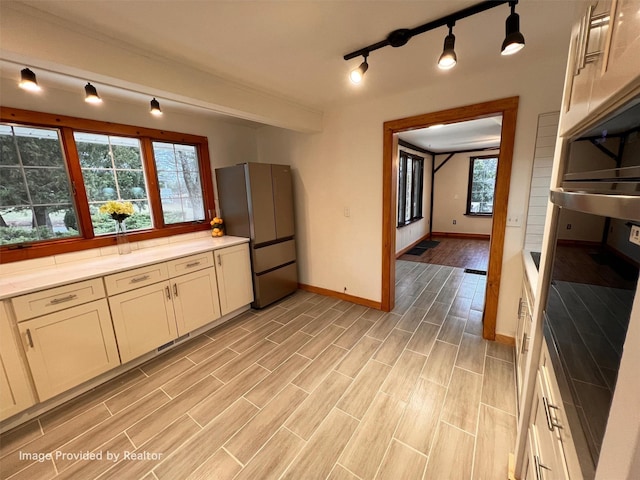 53 Jameson Hill Rd, Clinton Corners, NY 12514 - kitchen with appliances with stainless steel finishes, baseboards, and light wood finished floors