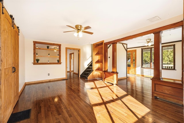 53 Jameson Hill Rd, Clinton Corners, NY 12514 - foyer with ceiling fan, decorative columns, a barn door, and baseboards