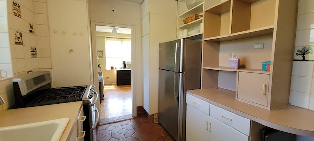 2601 Henry Hudson Pkwy Unit 5E, Bronx, NY 10463 - kitchen with appliances with stainless steel finishes, a sink, open shelves, and light countertops