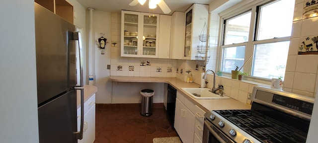 2601 Henry Hudson Pkwy Unit 5E, Bronx, NY 10463 - kitchen featuring stainless steel appliances, a sink, light countertops, tasteful backsplash, and plenty of natural light