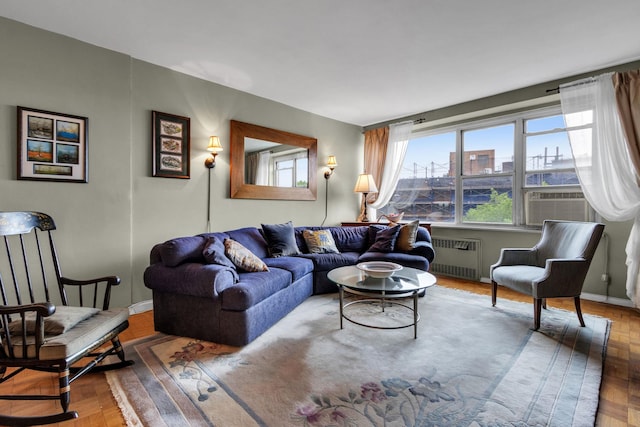 2601 Henry Hudson Pkwy Unit 5E, Bronx, NY 10463 - living room with radiator heating unit, wood finished floors, and cooling unit