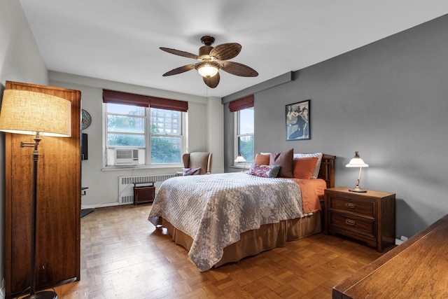 2601 Henry Hudson Pkwy Unit 5E, Bronx, NY 10463 - bedroom with cooling unit, radiator heating unit, and a ceiling fan