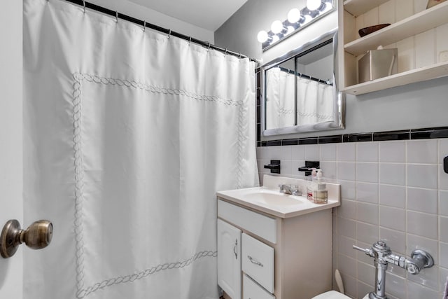 2601 Henry Hudson Pkwy Unit 5E, Bronx, NY 10463 - bathroom with vanity, tile walls, and a shower with shower curtain