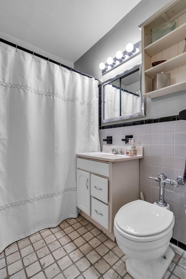 2601 Henry Hudson Pkwy Unit 5E, Bronx, NY 10463 - full bathroom featuring vanity, tile walls, a shower with shower curtain, and tile patterned floors